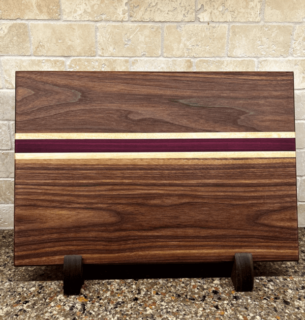 16"x11"x1" Walnut cutting board with birch and purple heart hightlights